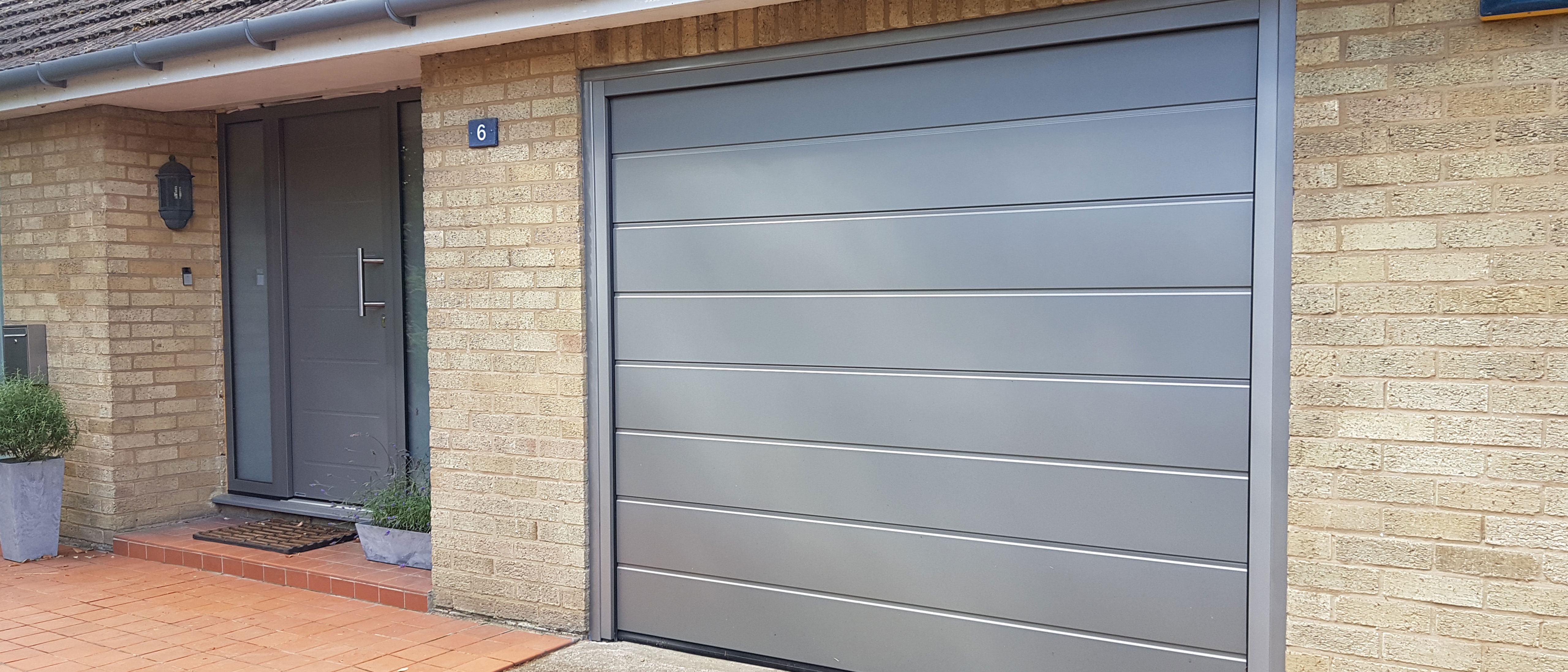 Porte Garage Passive House Installazione Preventivo Costo Casa Villa Villetta residenziali  industriali aziendali Porte tipo serrande a Voghera